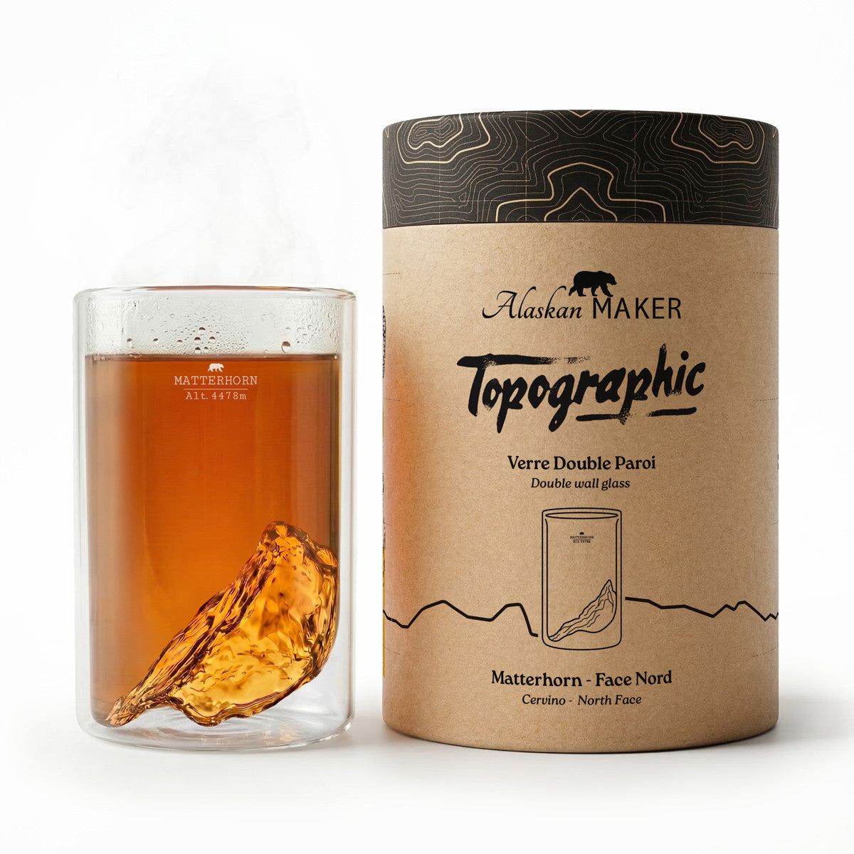 Matterhorn double wall glass — beside its kraft travel-journal tube