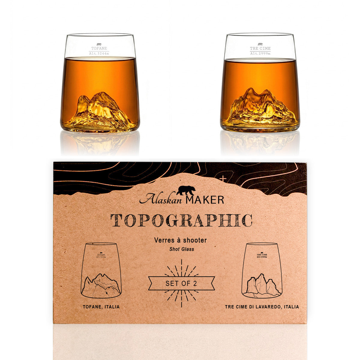 Both shooter glasses filled, beside the Topographic gift box