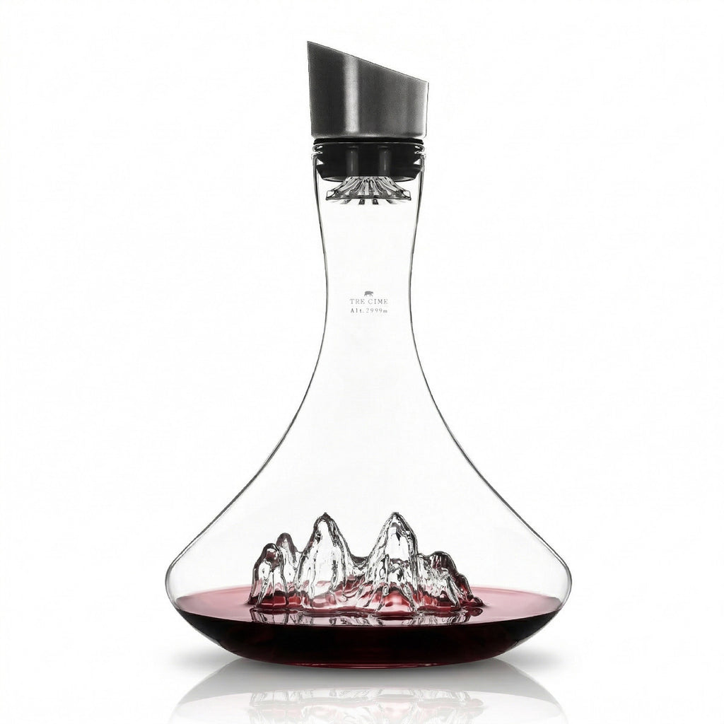 Tre Cime wine decanter holding a poured bottle