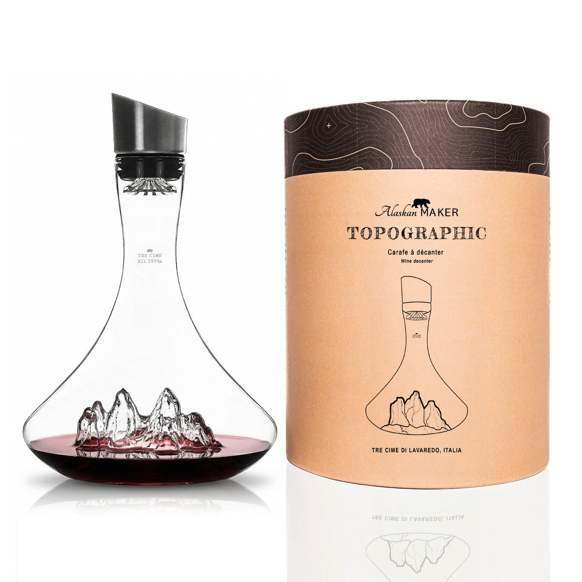 Tre Cime wine decanter beside its Topographic gift tube