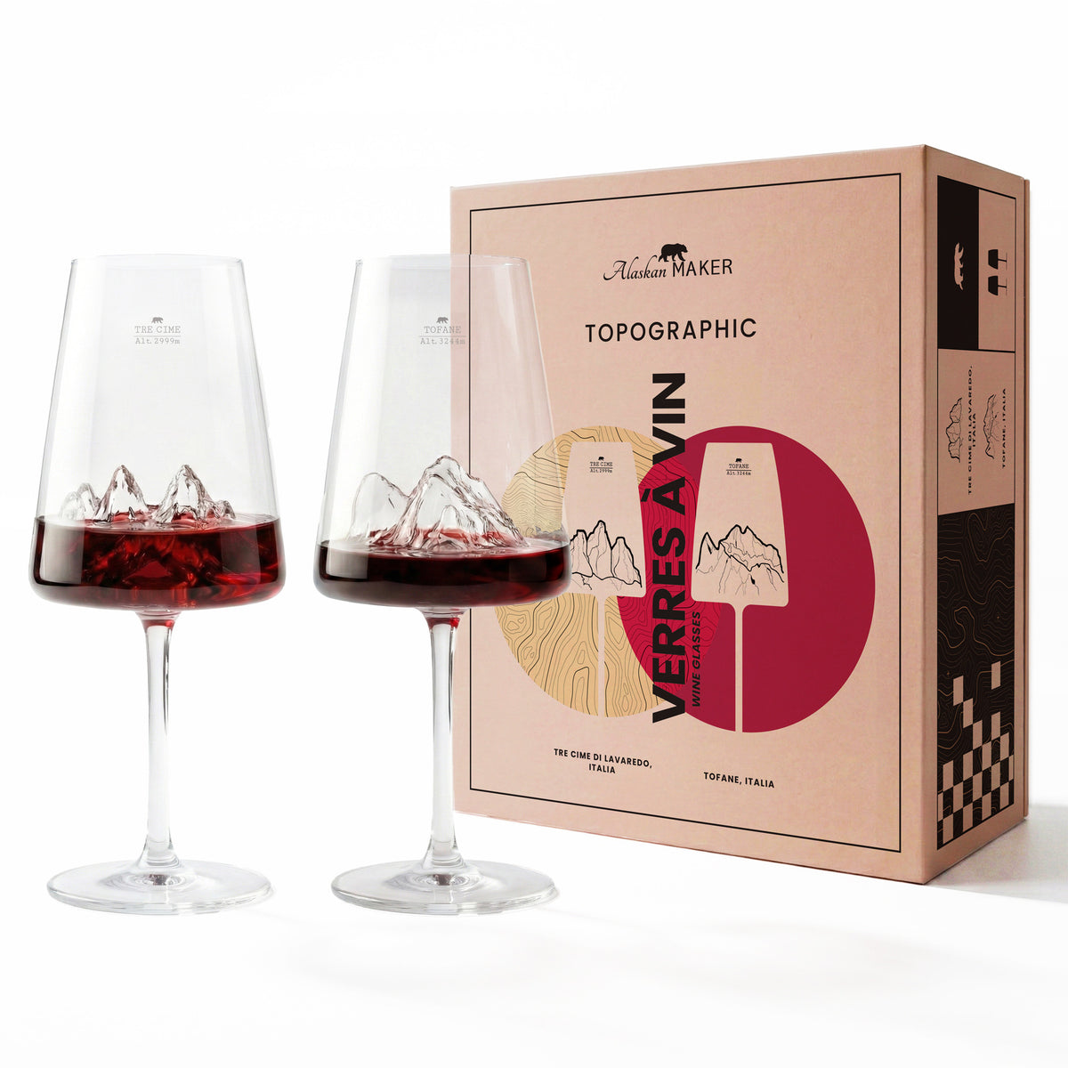 Tofane and Tre Cime di Lavaredo wine glasses beside their Topographic gift box